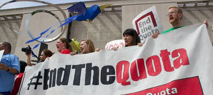 #EndTheQuota banner at rally